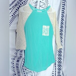 Teal with cream, lace, three-quarter sleeves
￼